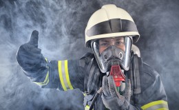 Firewoman in fire protection suit